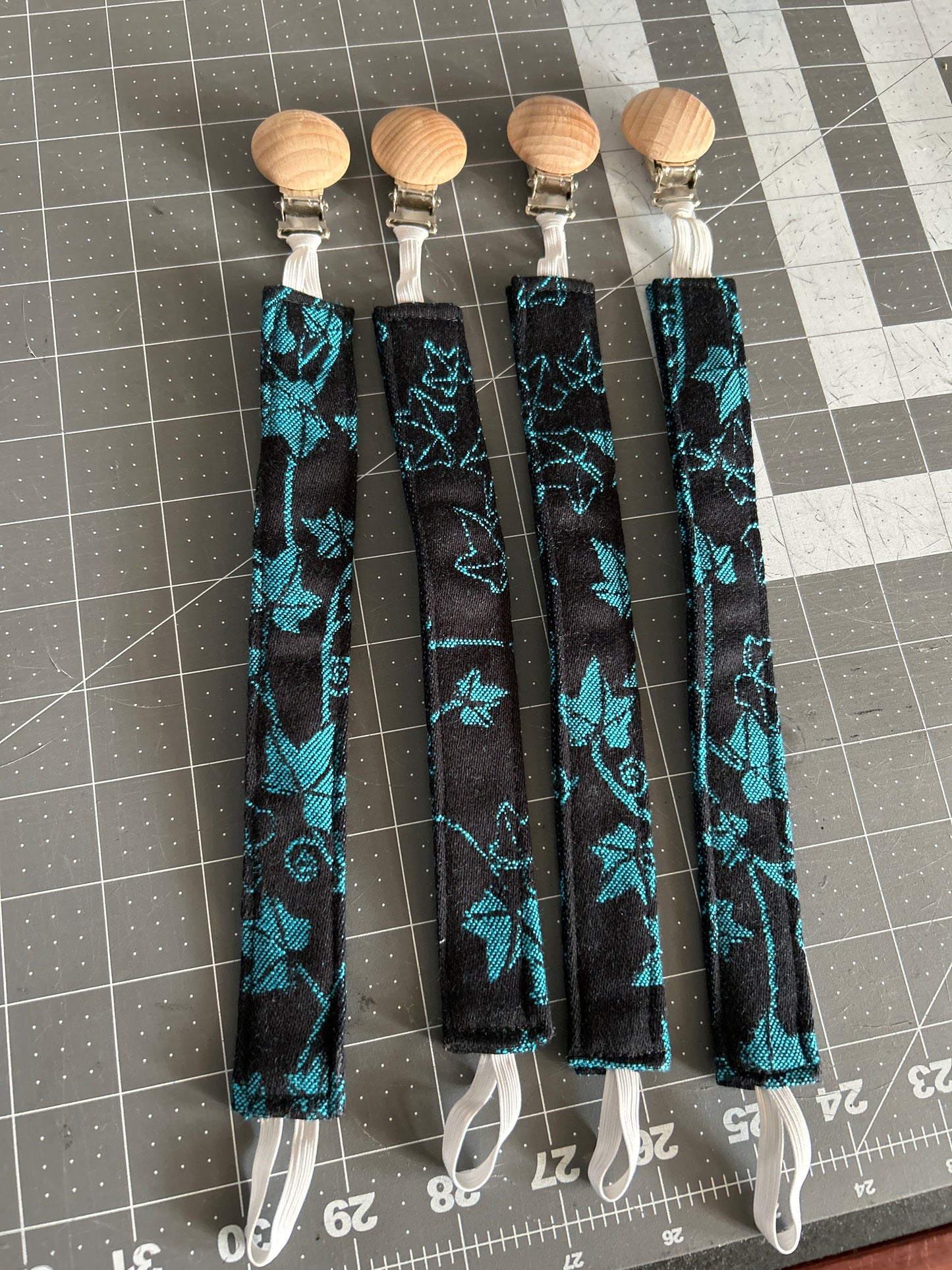 Black/Turquoise Leaves Pacifier Clip