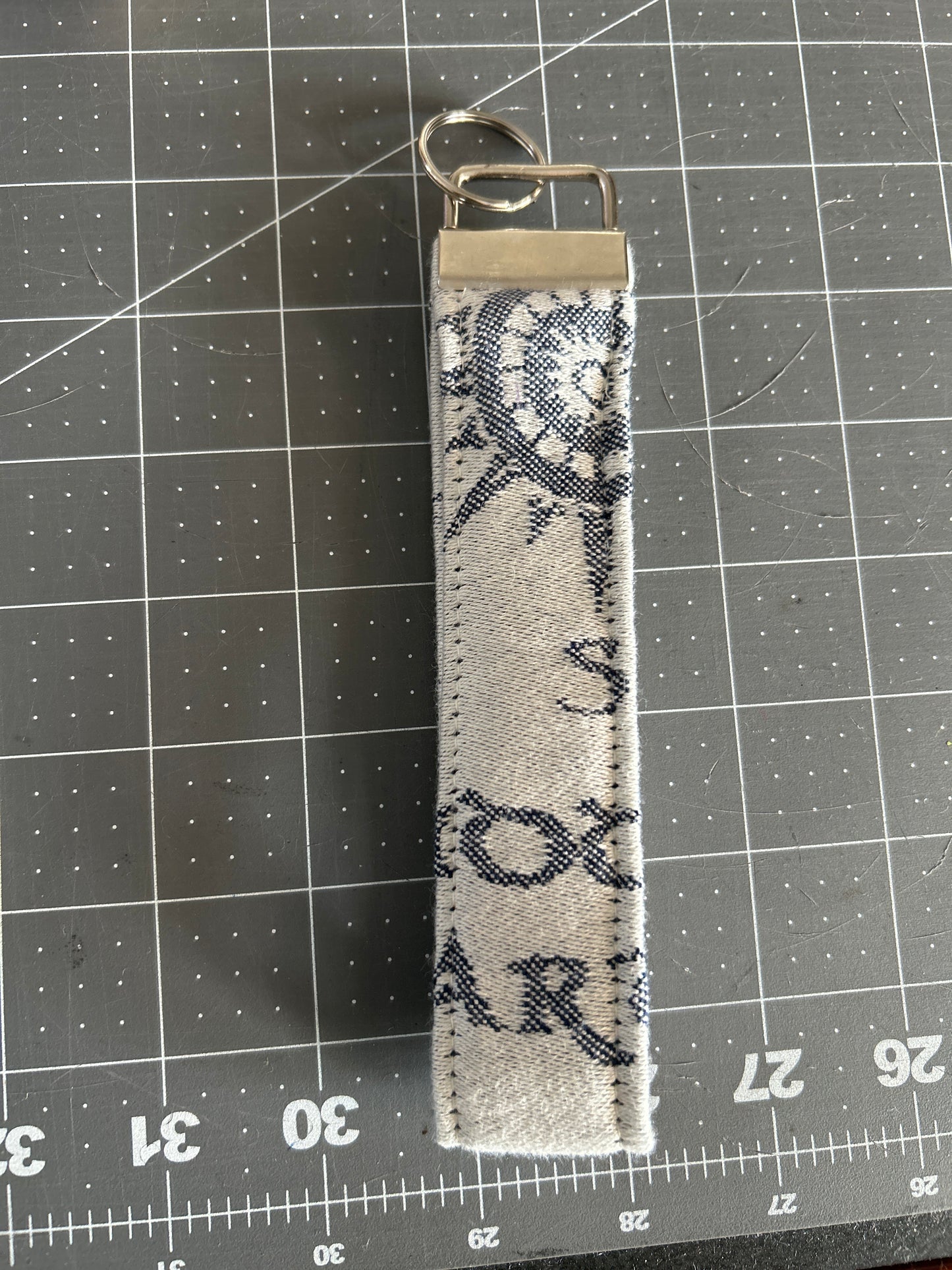 White/Navy Compass keychain